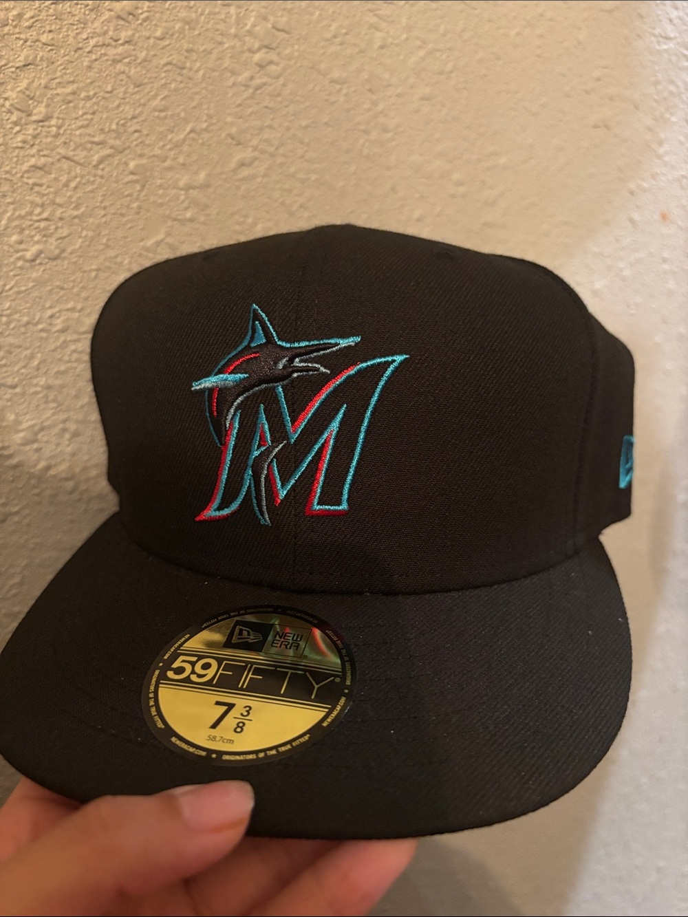 New Era Black Miami Marlins Fitted Cap with Teal & Red Logo